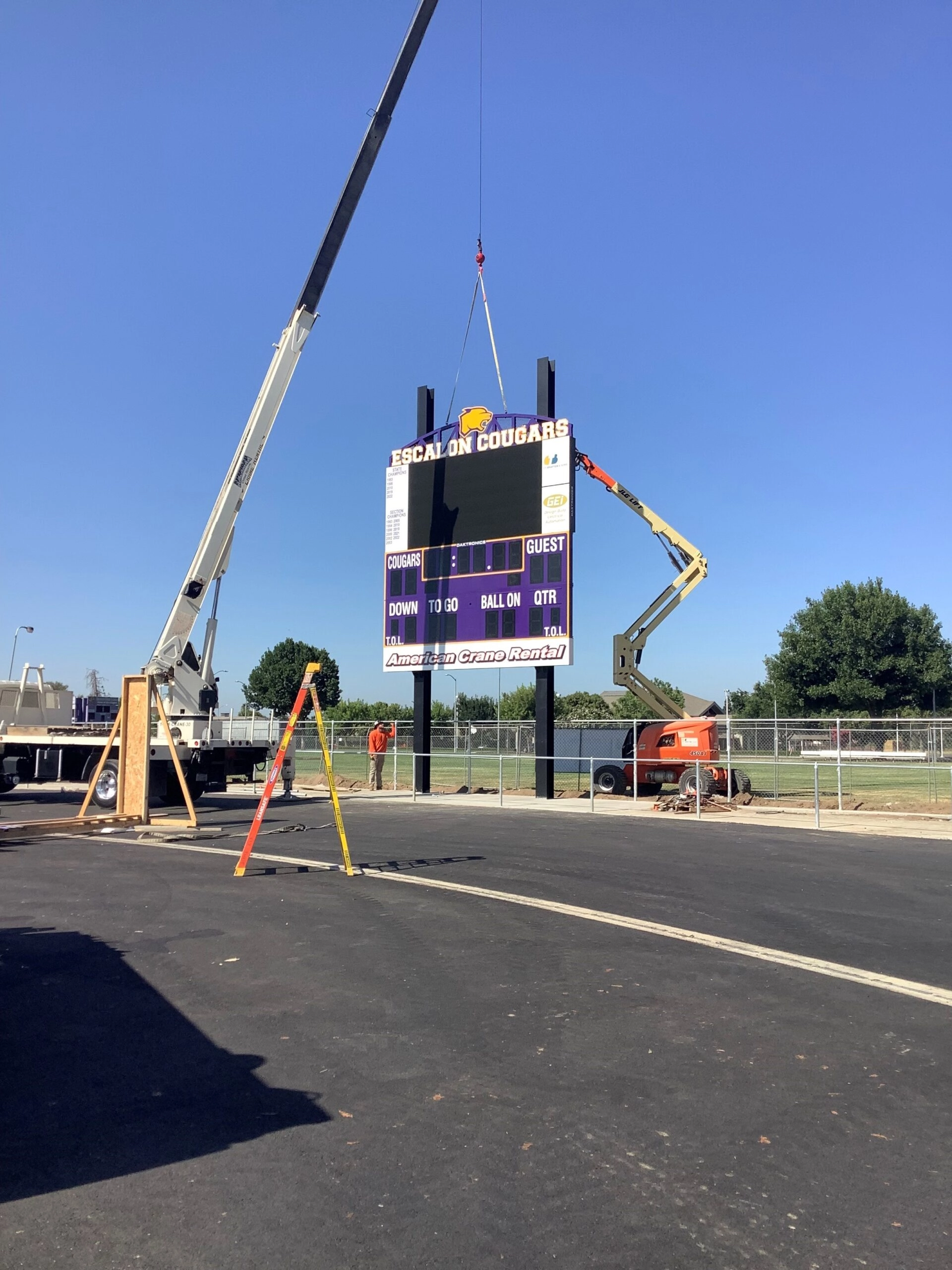 Escalon score board being installed